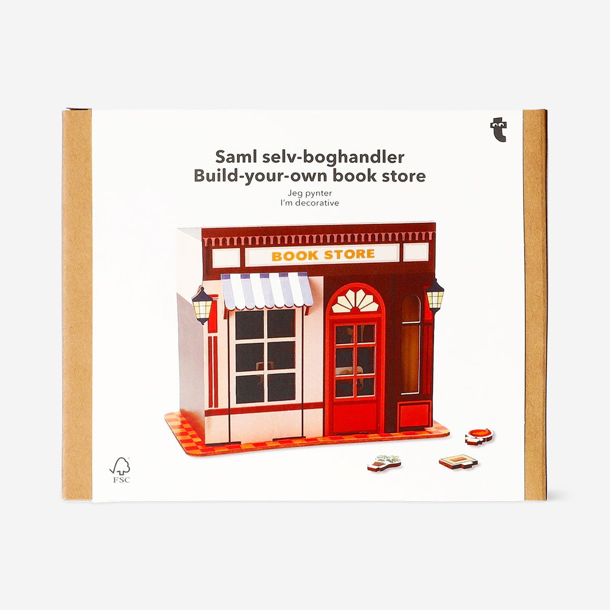 DIY wooden bookstore hobby kit by Flying Tiger Copenhagen, showing assembled mini bookcase with small wooden books and shelves.