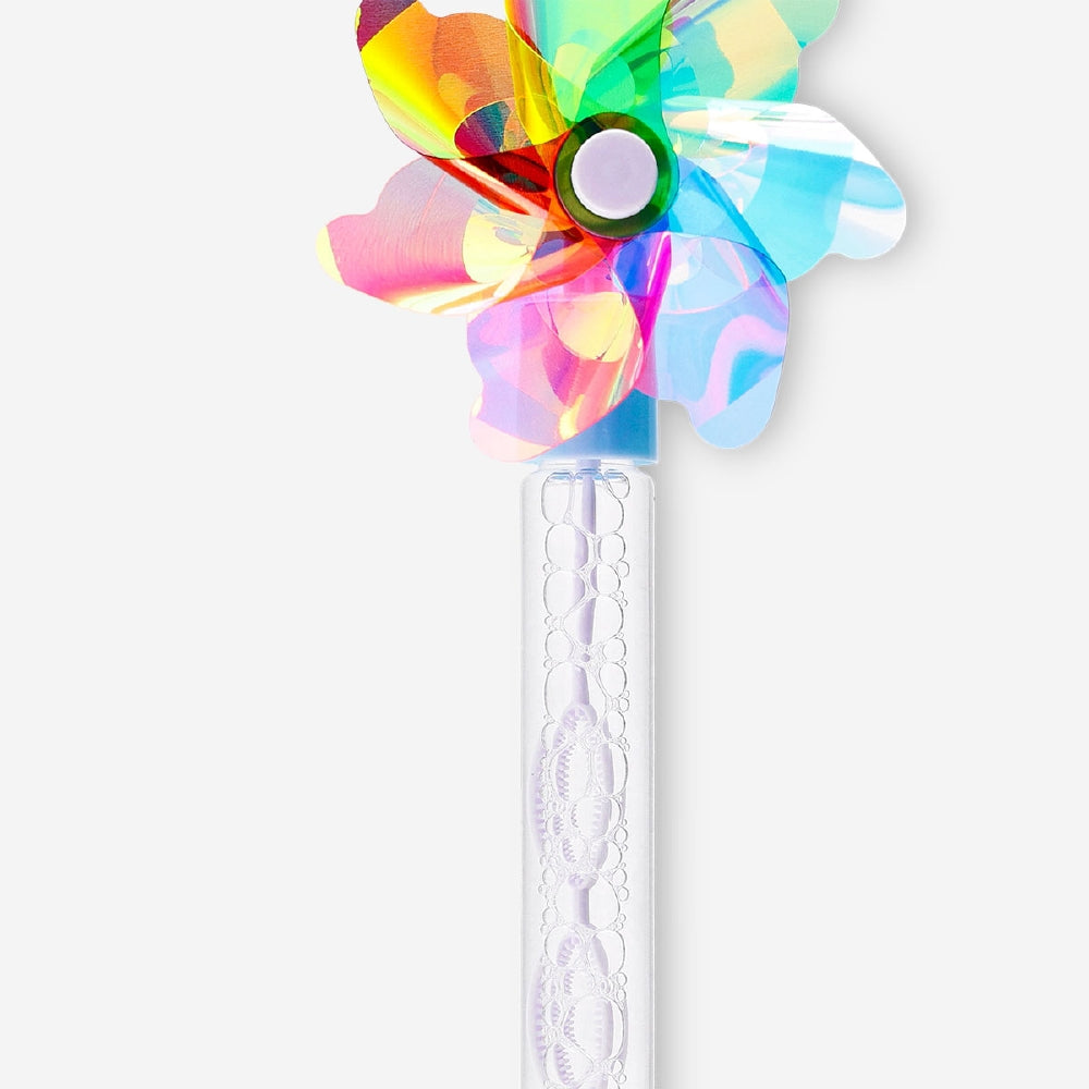 Colorful rainbow pinwheel soap bubble wand toy from Flying Tiger Copenhagen with vibrant spinning blades