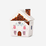 Flying Tiger Copenhagen DIY gingerbread house jar, 240 ml hobby kit with colorful candy decorations and gingerbread house components.
