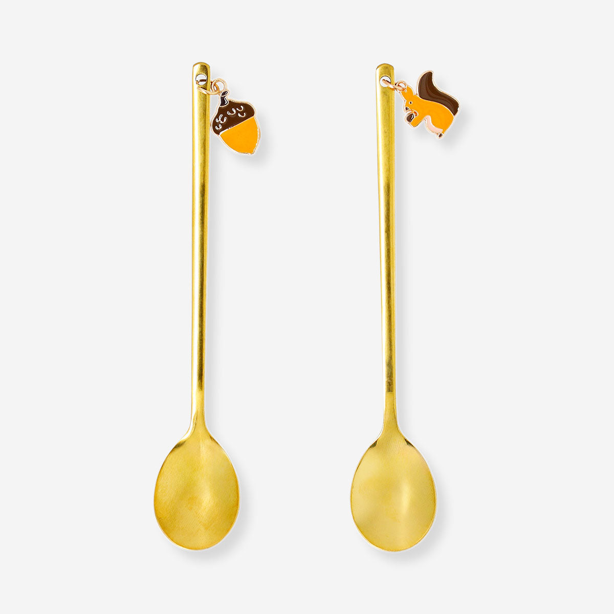 Set of two gold dessert spoons with acorn and squirrel decorations, Flying Tiger Copenhagen kitchen utensils for serving desserts.