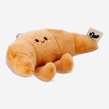 Flying Tiger Copenhagen plush croissant keyring toy showing a soft, detailed croissant-shaped plush keychain.