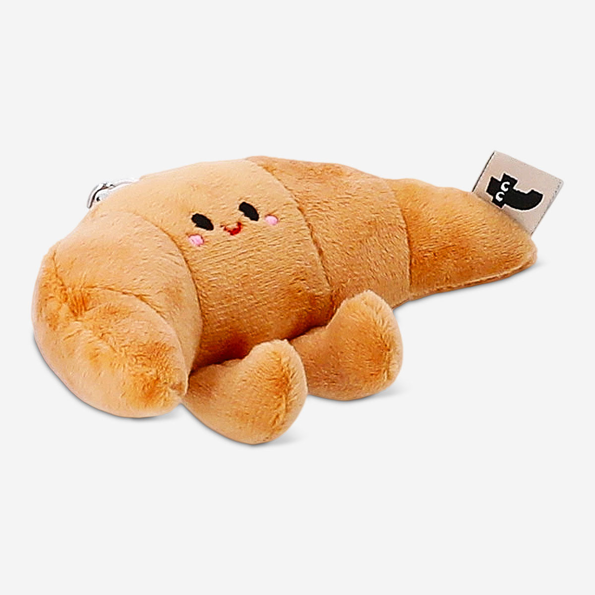 Flying Tiger Copenhagen plush croissant keyring toy showing a soft, detailed croissant-shaped plush keychain.