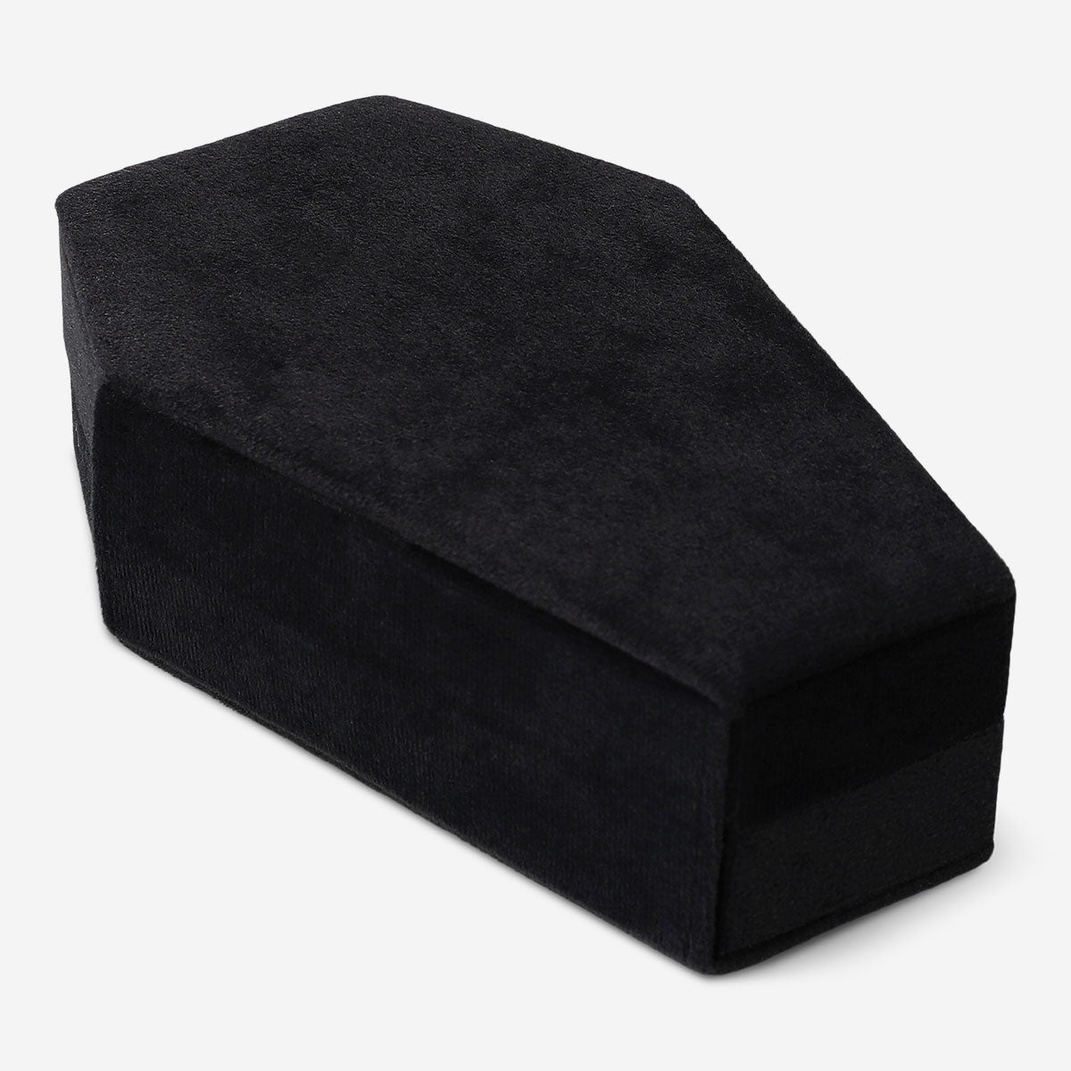 Black coffin-shaped jewellery storage container from Flying Tiger Copenhagen, designed for organizing personal care accessories.