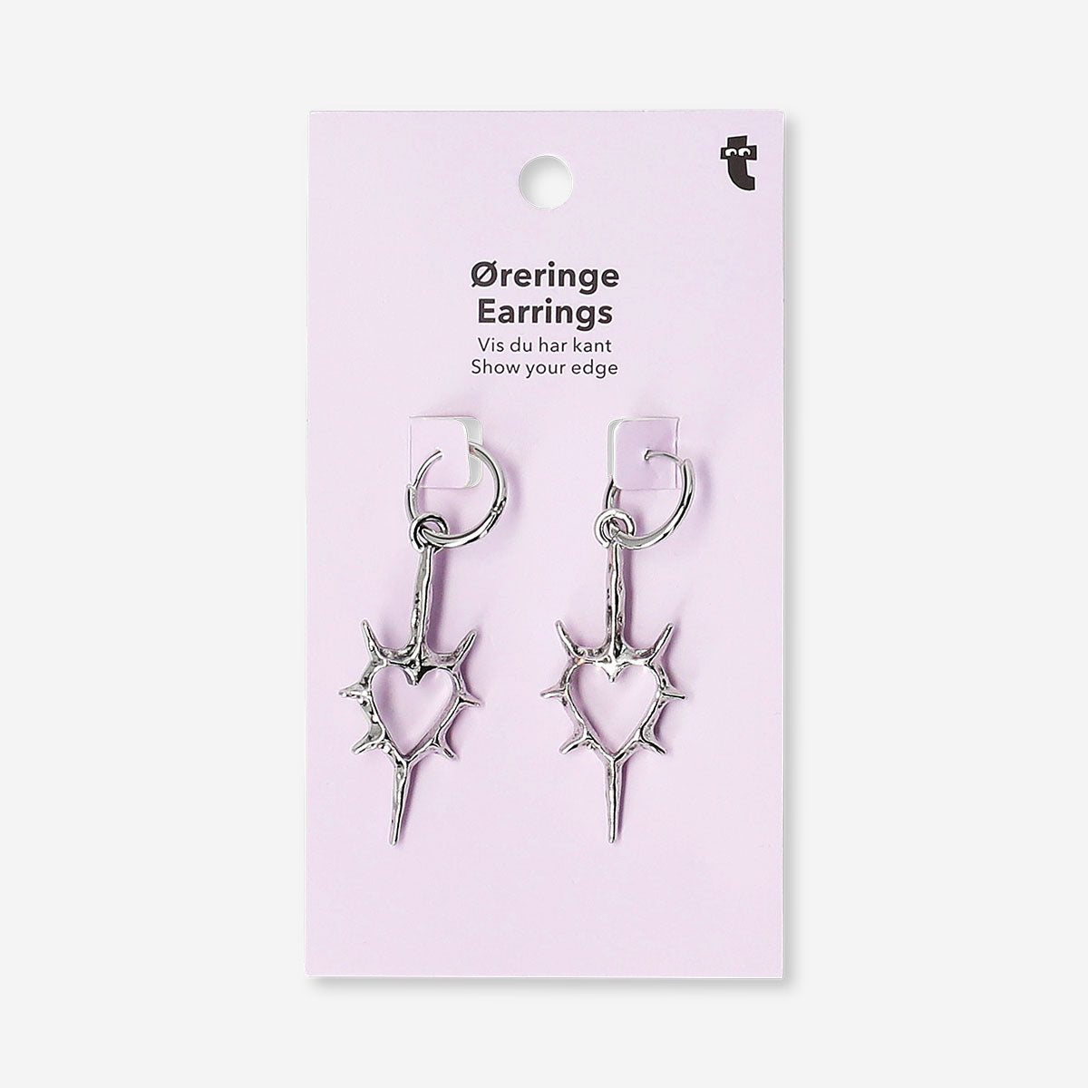 Hanging textile earrings with spiky silver heart designs, stylish jewelry by Flying Tiger Copenhagen.