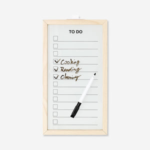 Wood-framed Flying Tiger Copenhagen office planner board with marker for organizing and note-taking.