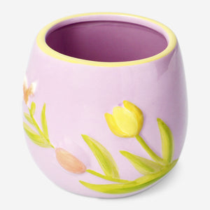 Decorative white flowerpot with embossed floral design, suitable for home decor, by Flying Tiger Copenhagen.