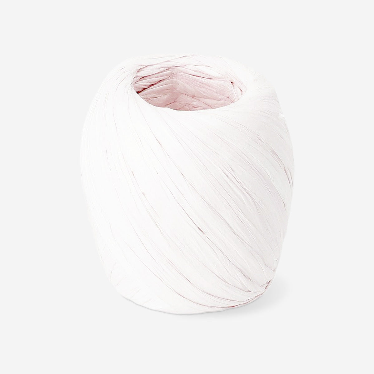 Light pink twisted paper ribbon, 20 meters, decorative office craft material by Flying Tiger Copenhagen, shown in a roll.
