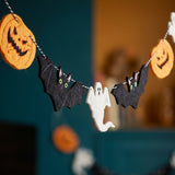 Halloween felt garland for party decor, 300 cm long, by Flying Tiger Copenhagen, featuring colorful felt shapes and festive design.