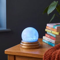 Flying Tiger Copenhagen scrying ball with light gadget, glowing crystal ball for mystical decor and visual effects.