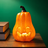 Luminous pumpkin gadget from Flying Tiger Copenhagen, 18 cm tall, featuring a glowing, decorative pumpkin with a modern design.