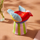 Ceramic bird tealight holder with a striped base, decorative home accessory by Flying Tiger Copenhagen.