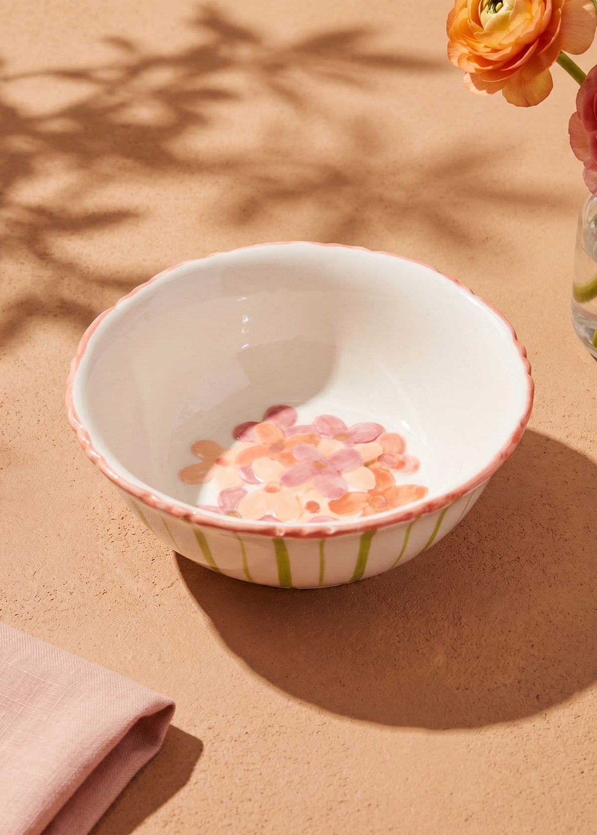 Ceramic bowl with hand-painted flower design, 12 cm in size, ideal for kitchen use, by Flying Tiger Copenhagen.