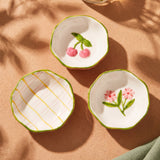 Set of three ceramic bowls with spring-themed floral designs, perfect for kitchen use, by Flying Tiger Copenhagen.