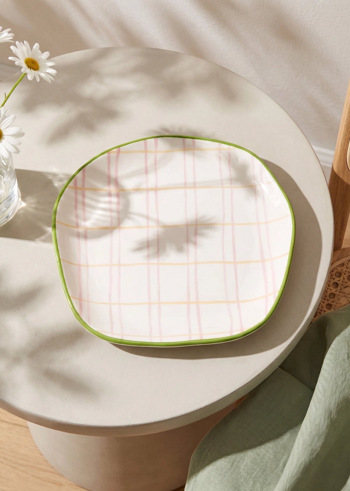 Hand-painted chequered design ceramic plate, 15 cm, from Flying Tiger Copenhagen, ideal for kitchen use and serving food.