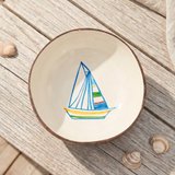 Hand-painted coconut bowl with boat motif, 13 cm, from Flying Tiger Copenhagen, showcasing intricate artwork on a natural coconut surface.