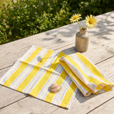 Two yellow striped fabric napkins for home use, featuring vibrant pattern and soft cotton material from Flying Tiger Copenhagen.