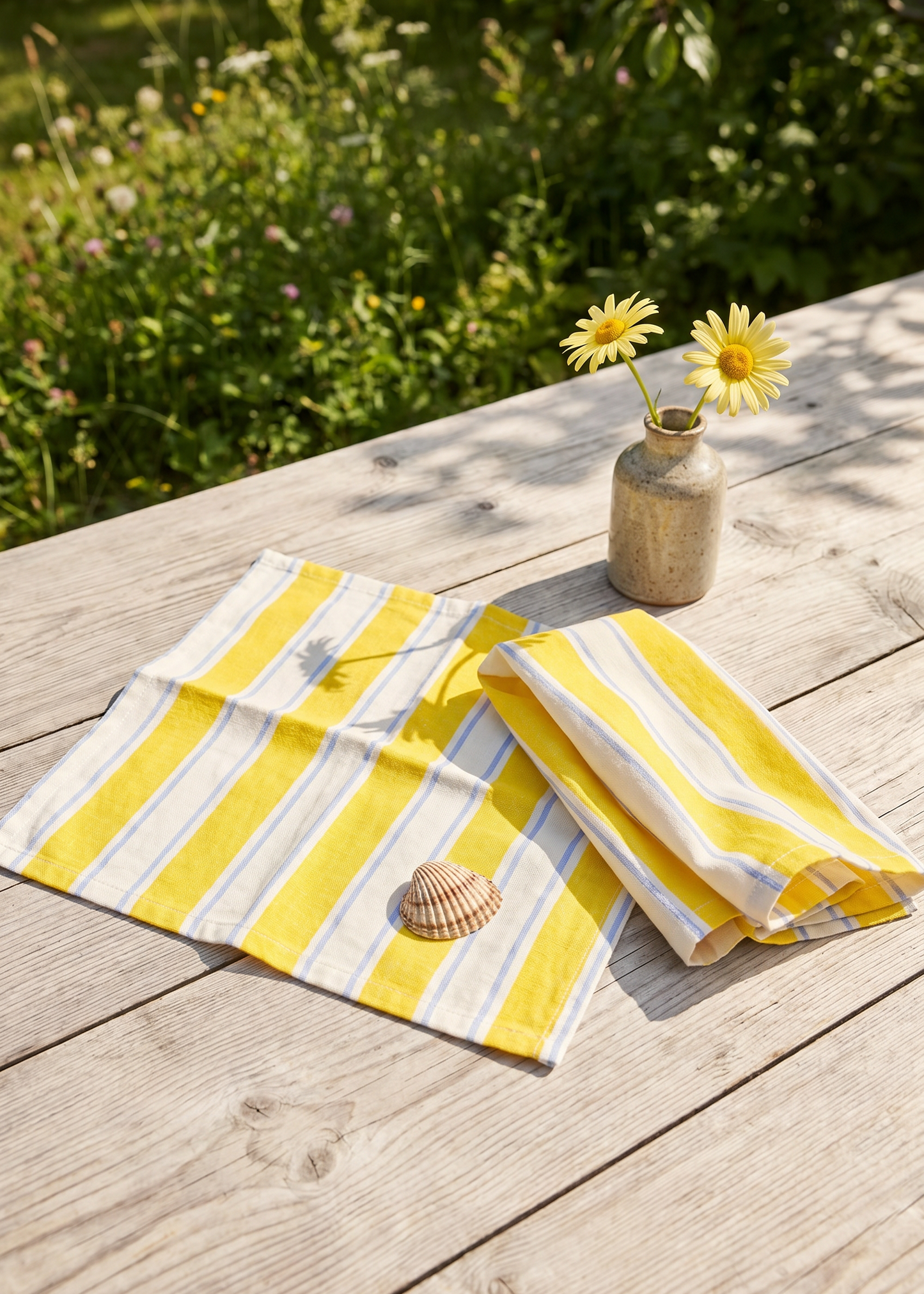 Two yellow striped fabric napkins for home use, featuring vibrant pattern and soft cotton material from Flying Tiger Copenhagen.