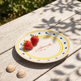 Ceramic kitchen plate with colorful dots and fish design, 16 cm, from Flying Tiger Copenhagen, featuring a vibrant pattern.