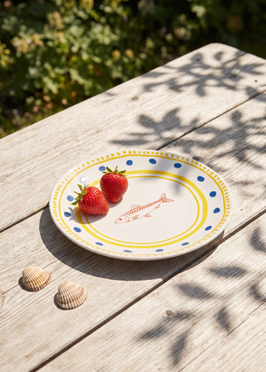 Ceramic kitchen plate with dotted and fish design, 16 cm, from Flying Tiger Copenhagen, featuring colorful patterns on a white background.