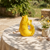 Yellow fish-shaped vase, 21 cm tall, made of ceramic, designed for home decor by Flying Tiger Copenhagen.