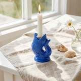 Fish-shaped candle holder from Flying Tiger Copenhagen, 12 cm tall, designed for home decor with a sleek, modern look.