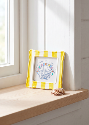 Yellow ceramic striped picture frame measuring 10x10 cm, perfect for home decor by Flying Tiger Copenhagen.