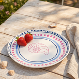 Ceramic kitchen plate with blue dots and seashell design, 20 cm diameter, by Flying Tiger Copenhagen.