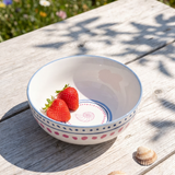 Ceramic kitchen bowl with dotted pattern and seashell design, 12 cm from Flying Tiger Copenhagen, showcasing its decorative and functional style.