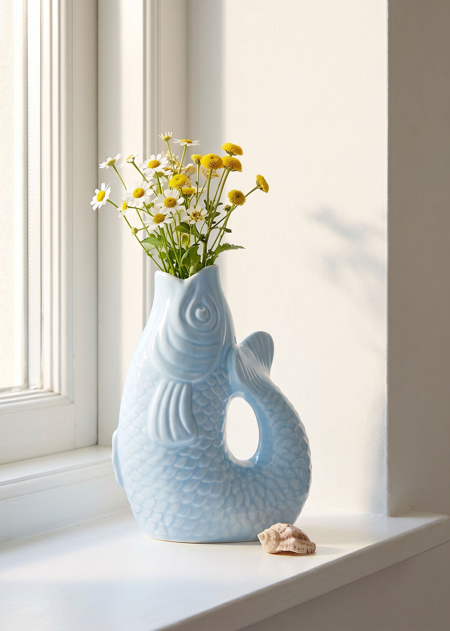 Light blue fish-shaped ceramic vase, 21 cm tall, designed for home decor by Flying Tiger Copenhagen.