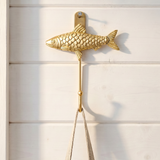 Gold fish wall hook from Flying Tiger Copenhagen, decorative home accessory with a fish design perfect for wall organization.