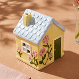 Decorative yellow ceramic house, 13 cm tall, perfect for home decor by Flying Tiger Copenhagen.