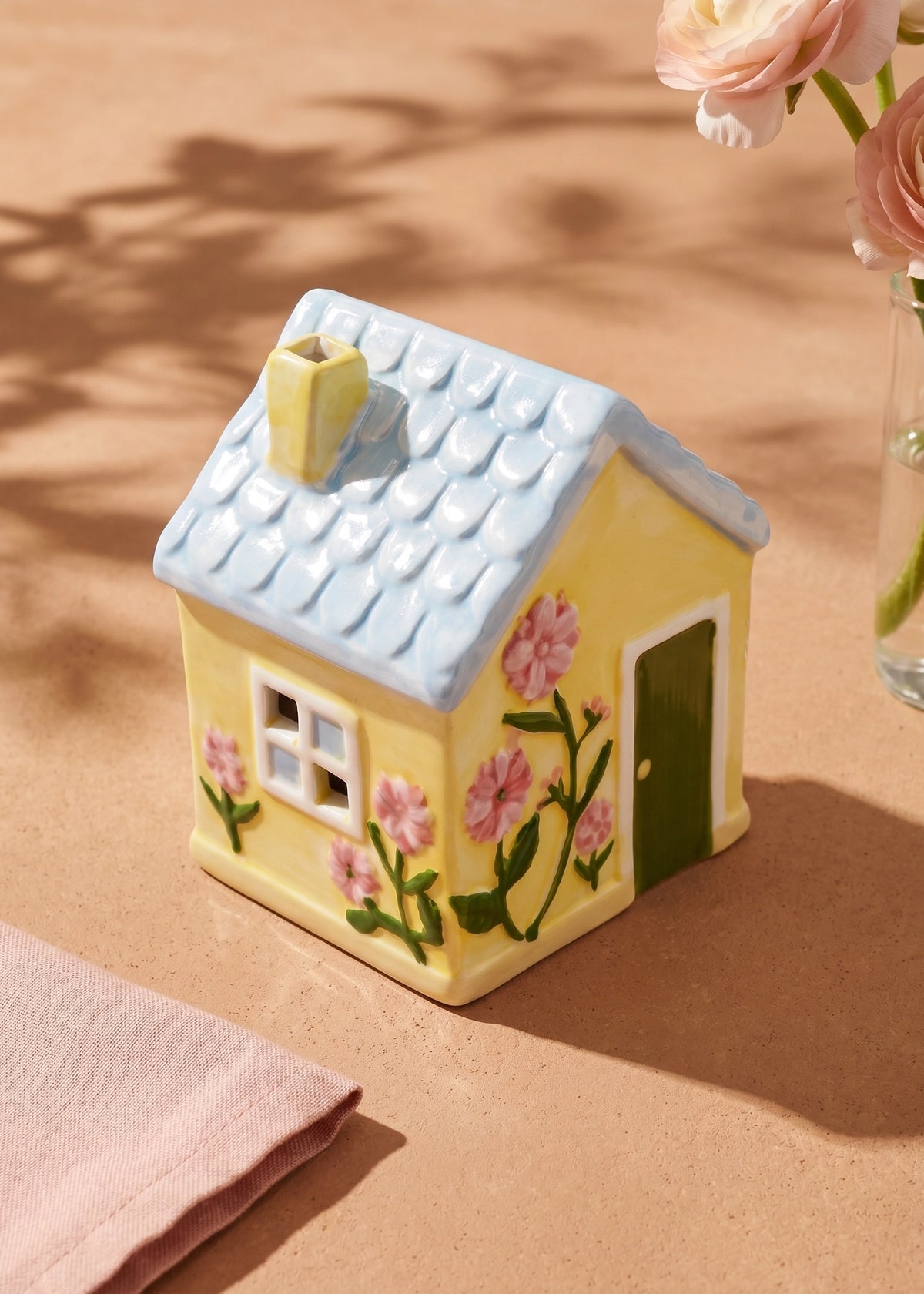 Decorative yellow ceramic house, 13 cm tall, perfect for home decor by Flying Tiger Copenhagen.