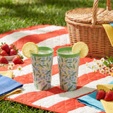 Two tall reusable party cups with colorful summer print from Flying Tiger Copenhagen, perfect for summer gatherings.
