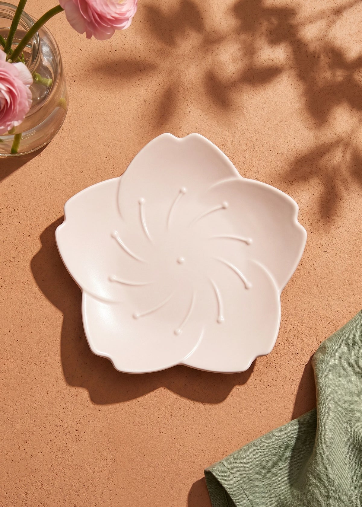 Pink flower-shaped ceramic plate, 18 cm, from Flying Tiger Copenhagen, ideal for kitchen use or decorative display.