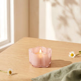 Milky pink glass tealight holder for home decor, featuring a smooth, rounded design by Flying Tiger Copenhagen.