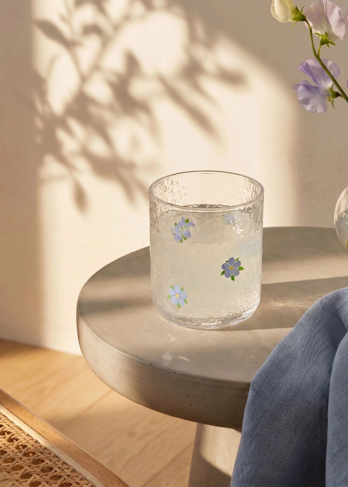 Sparkly lemonade glass with blue embossed flower design, 340 ml, Flying Tiger Copenhagen kitchen drinkware.