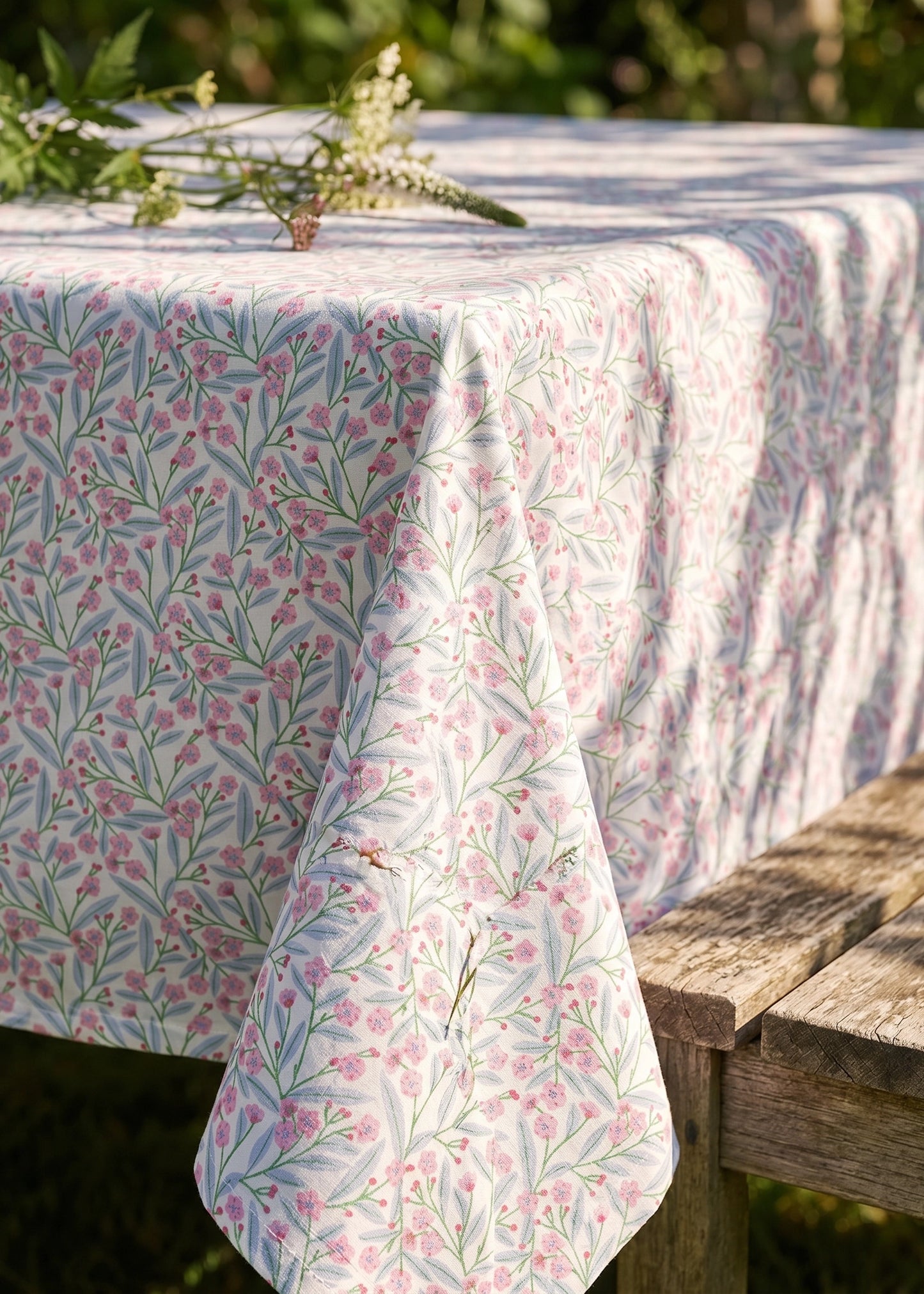Fabric tablecloth with floral design, 140x220 cm, from Flying Tiger Copenhagen, featuring a colorful summer garden pattern.