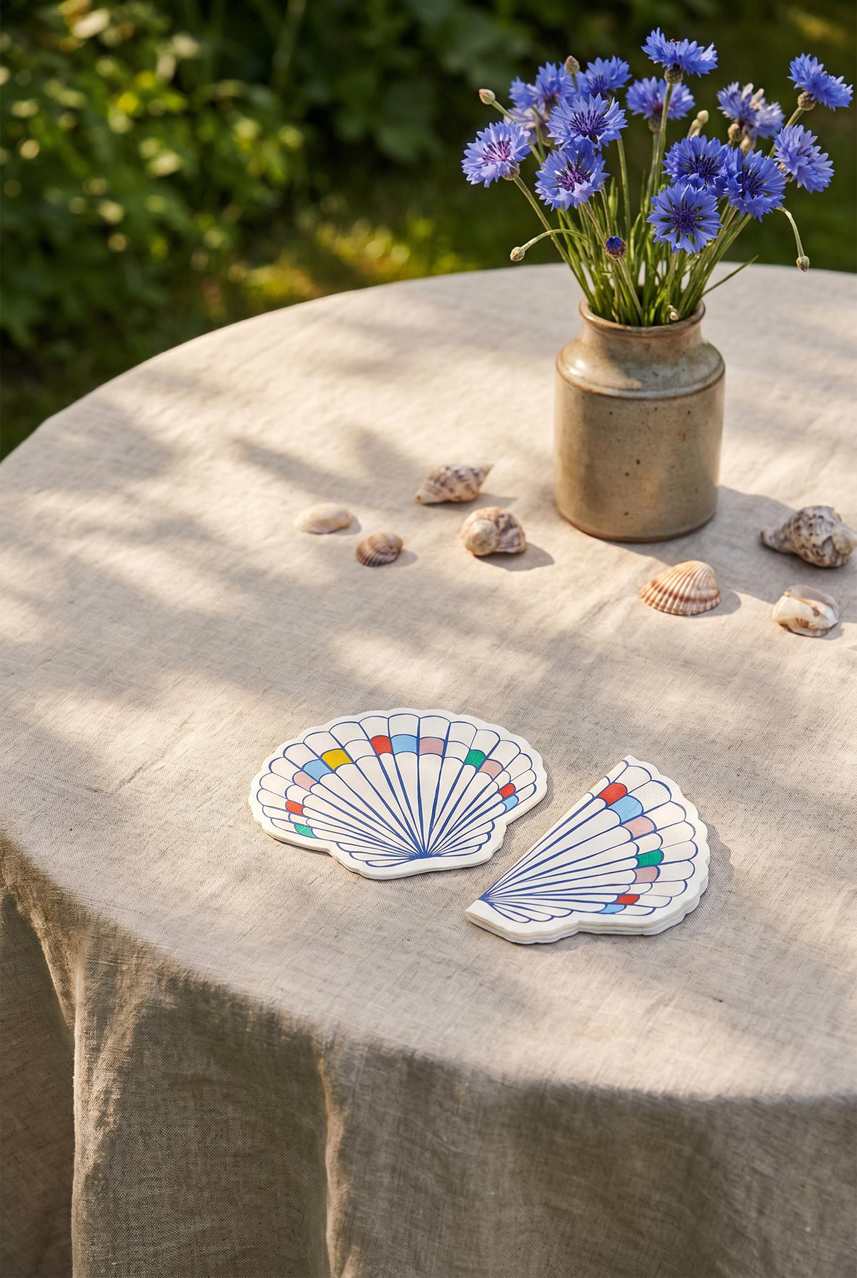 Set of 16 seashell-themed paper napkins for parties from Flying Tiger Copenhagen, featuring a summer-inspired seashell design.