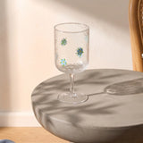 Elegant 350ml wine glass from Flying Tiger Copenhagen with blue embossed floral design for kitchen use.
