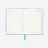 Blue floral A5 daily diary 2027 by Flying Tiger Copenhagen for office use, featuring a floral design on the cover.