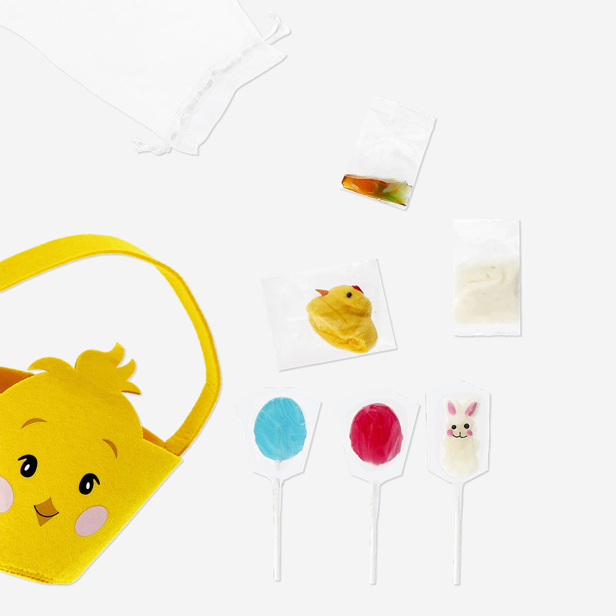 Colorful candy mix in a felt Easter chicken basket, featuring assorted sweets from Flying Tiger Copenhagen, perfect for Easter treats.