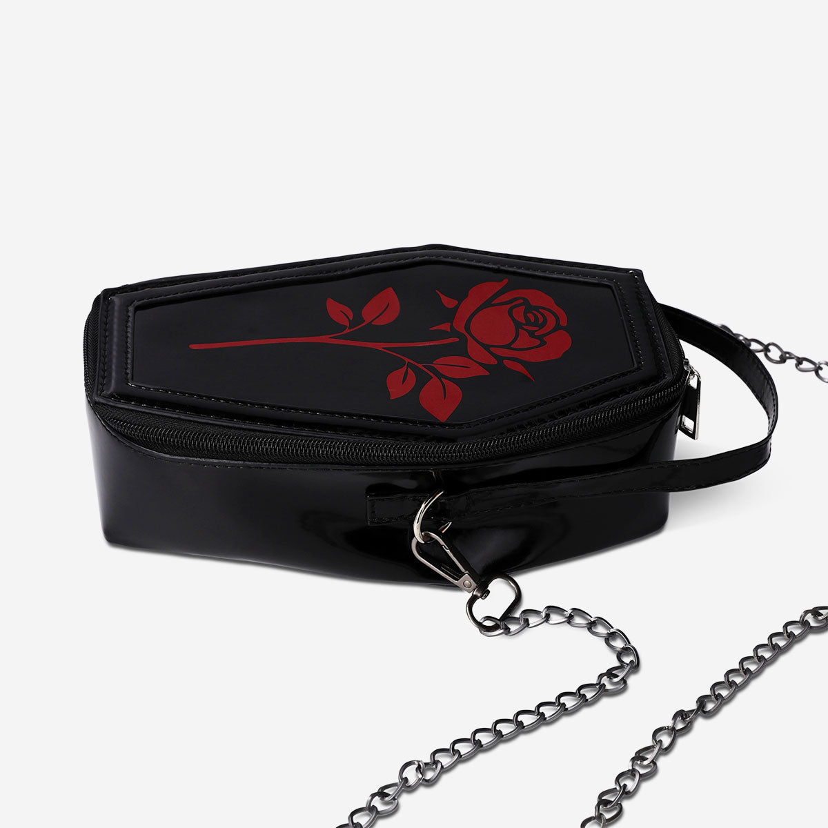 Black coffin-shaped handbag made of textile by Flying Tiger Copenhagen, featuring a sleek, gothic-inspired design.