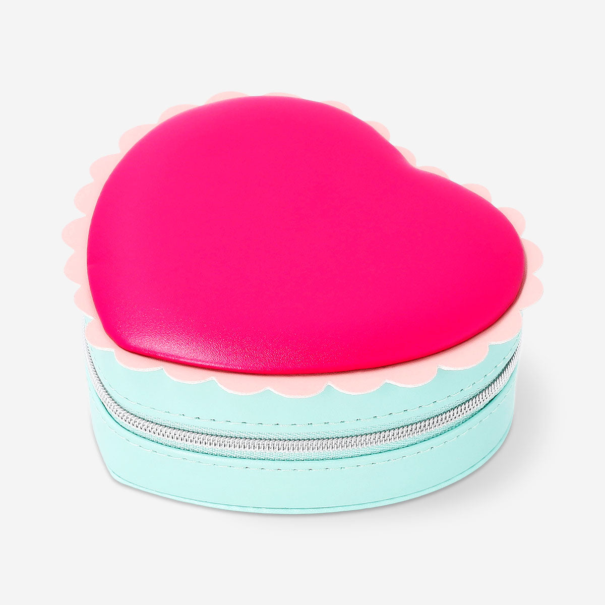 Heart-shaped jewelry box with scalloped edges, Flying Tiger Copenhagen personal care storage in soft pastel color.