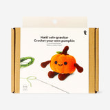Crochet pumpkin kit from Flying Tiger Copenhagen for hobby crafting, including yarn and crochet tools in a colorful set.
