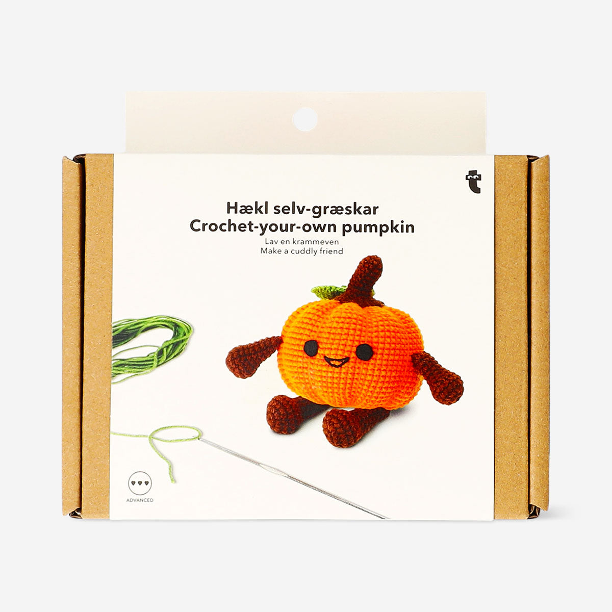 Crochet pumpkin kit from Flying Tiger Copenhagen for hobby crafting, including yarn and crochet tools in a colorful set.