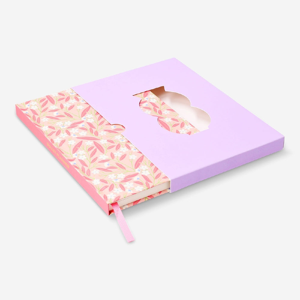 A5 bullet planner from Flying Tiger Copenhagen with black cover and organized pages for daily planning and note-taking.