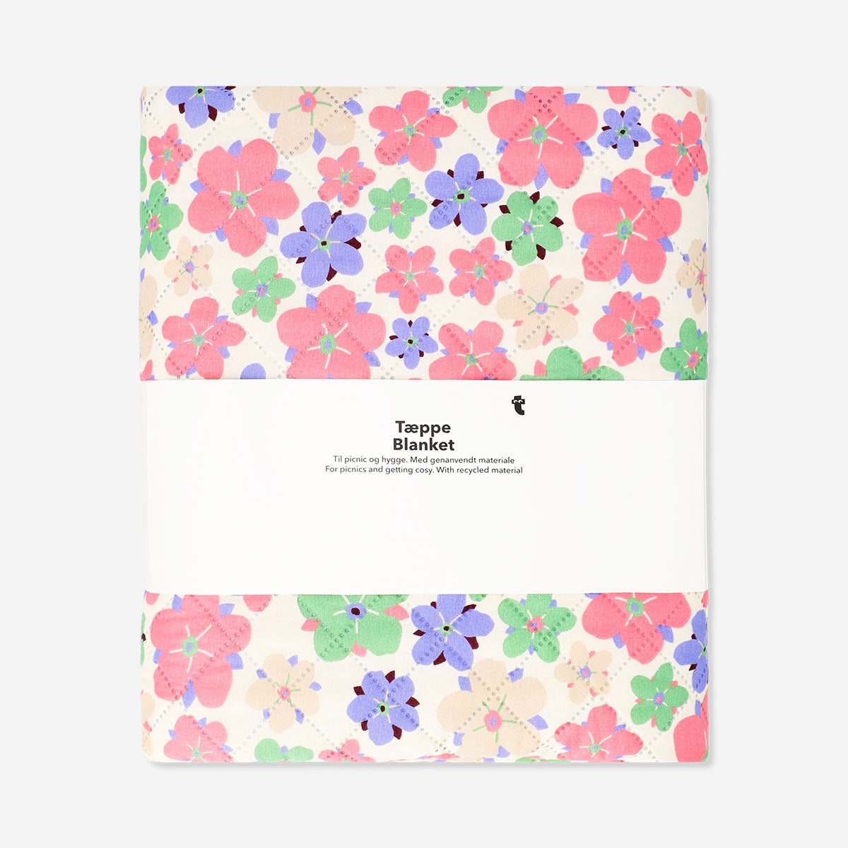 Quilted floral blanket from Flying Tiger Copenhagen, 170x130 cm, featuring colorful floral patterns on soft fabric.