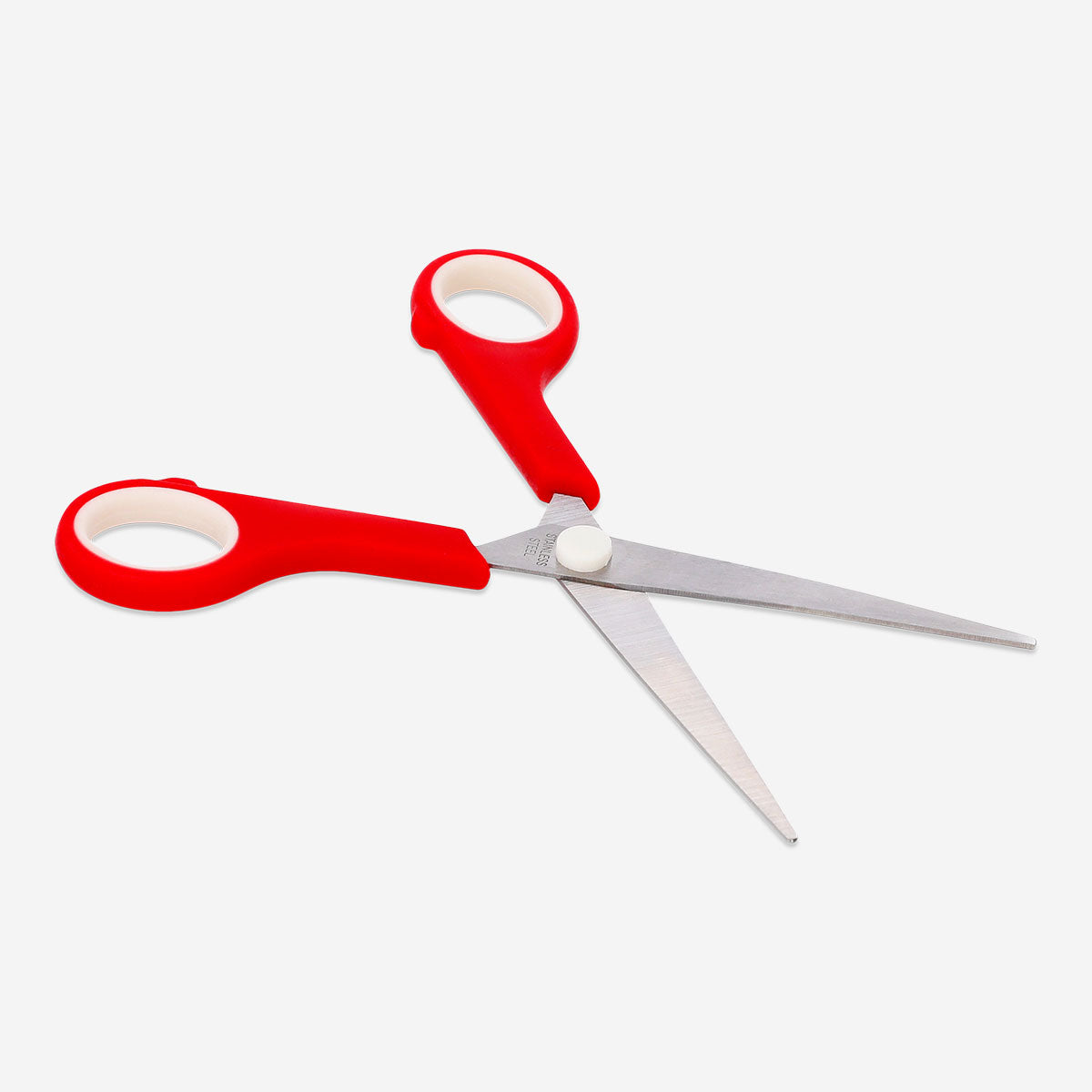 Red office scissors from Flying Tiger Copenhagen with sharp blades and ergonomic handles for precise cutting.
