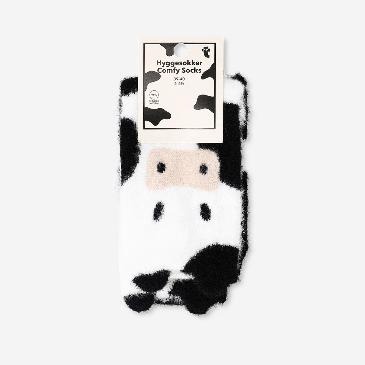 Flying Tiger Copenhagen Comfy Cow socks in size 39/40, soft textile with playful cow design, perfect for casual wear.