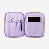 Floral tablet cover and organizer by Flying Tiger Copenhagen, 29x23 cm, with colorful floral pattern and media storage compartments.